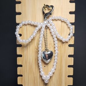 Faux Pearl Beaded Bow Purse Charm With Silver Heart Dangle